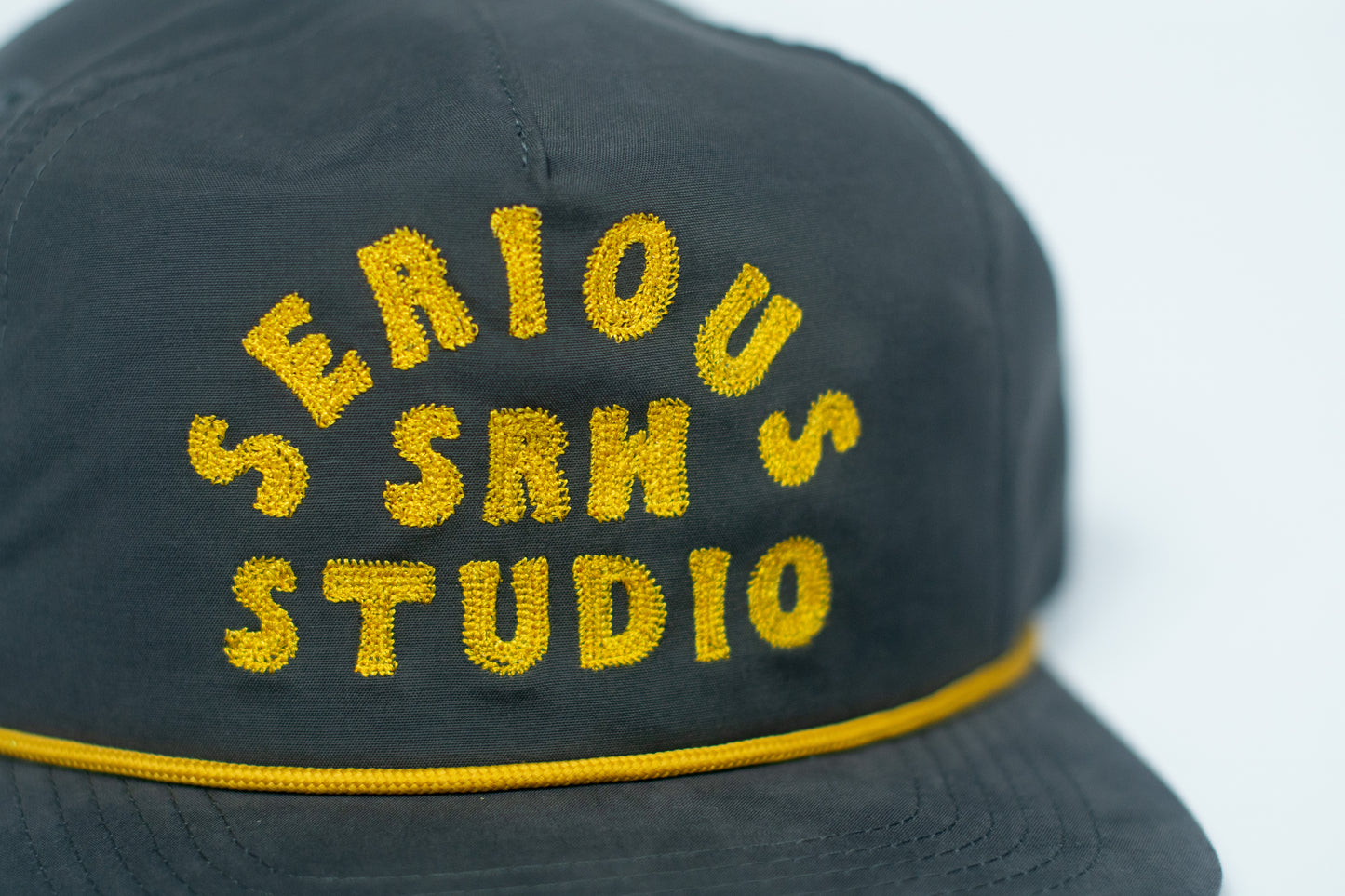 SERIOUS STUDIO CHAIN STITCH SNAPBACK HAT - NAVY / GOLD