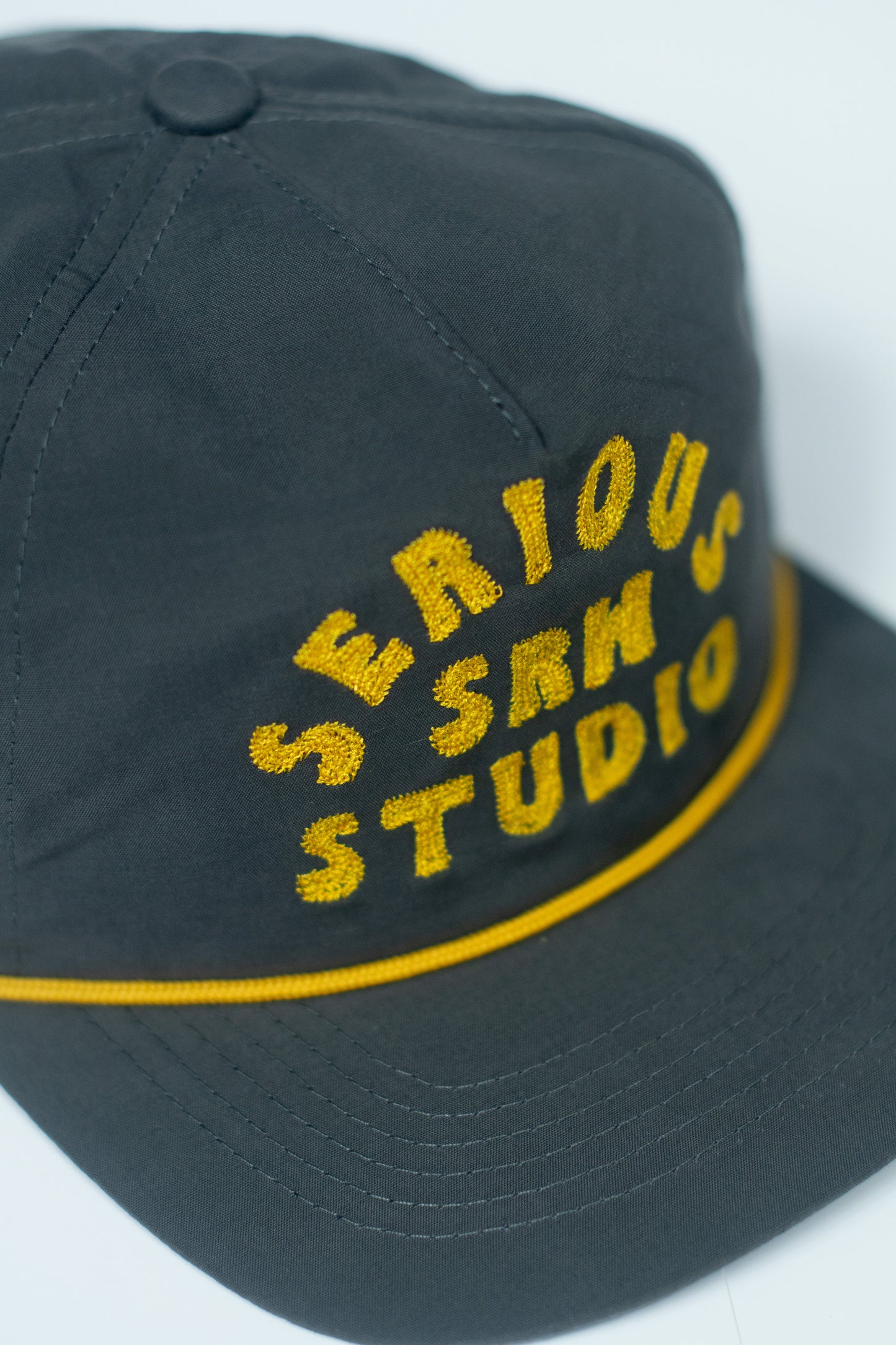 SERIOUS STUDIO CHAIN STITCH SNAPBACK HAT - NAVY / GOLD