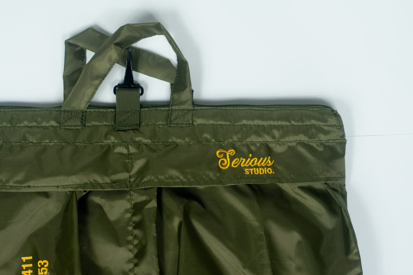 SERIOUS STUDIO HELMET BAG - GREEN / GOLD