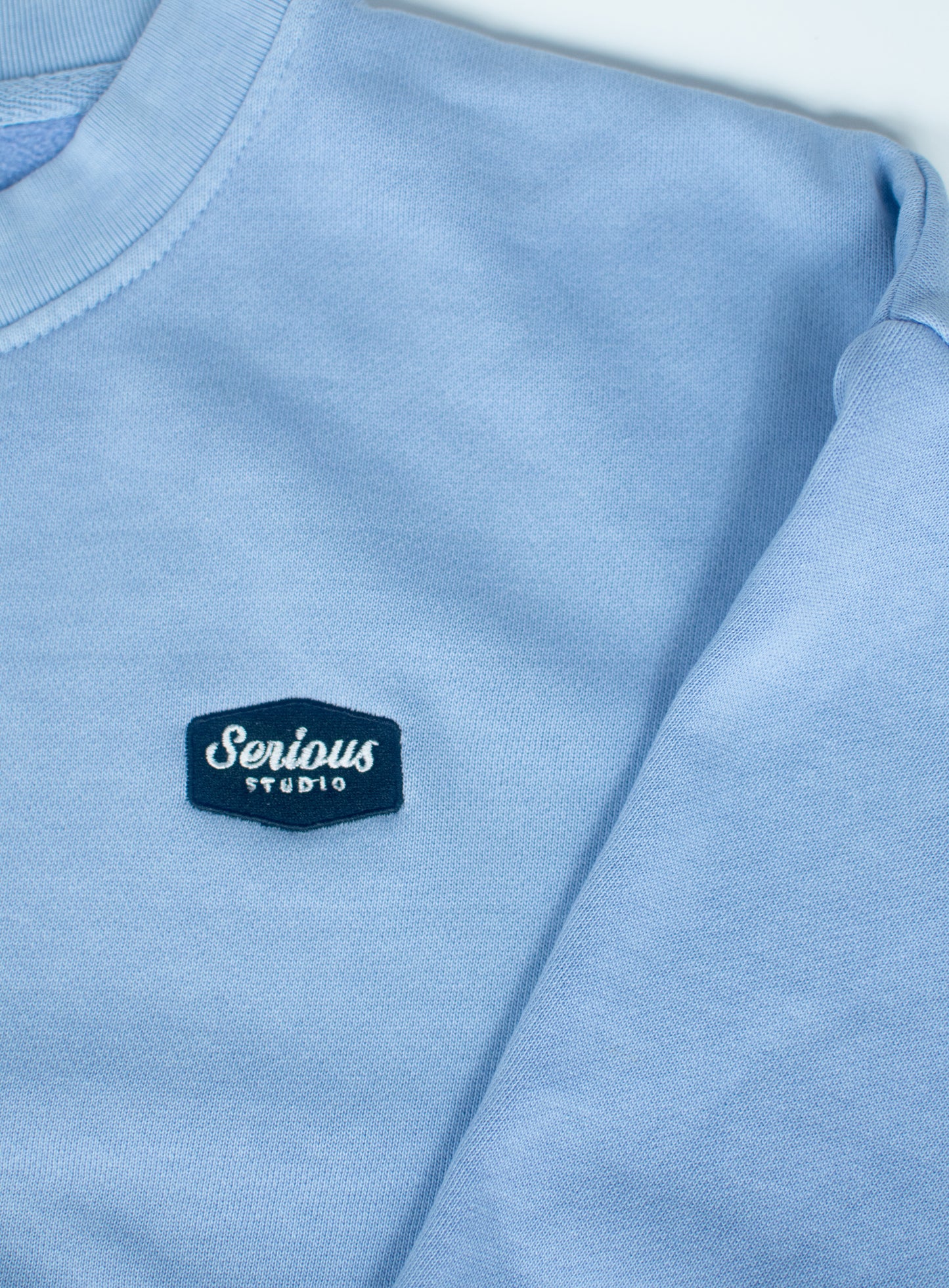 *PRE-ORDER* SERIOUS STUDIO ICONIC CREW NECK SWEATSHIRT - PEBBLE BLUE