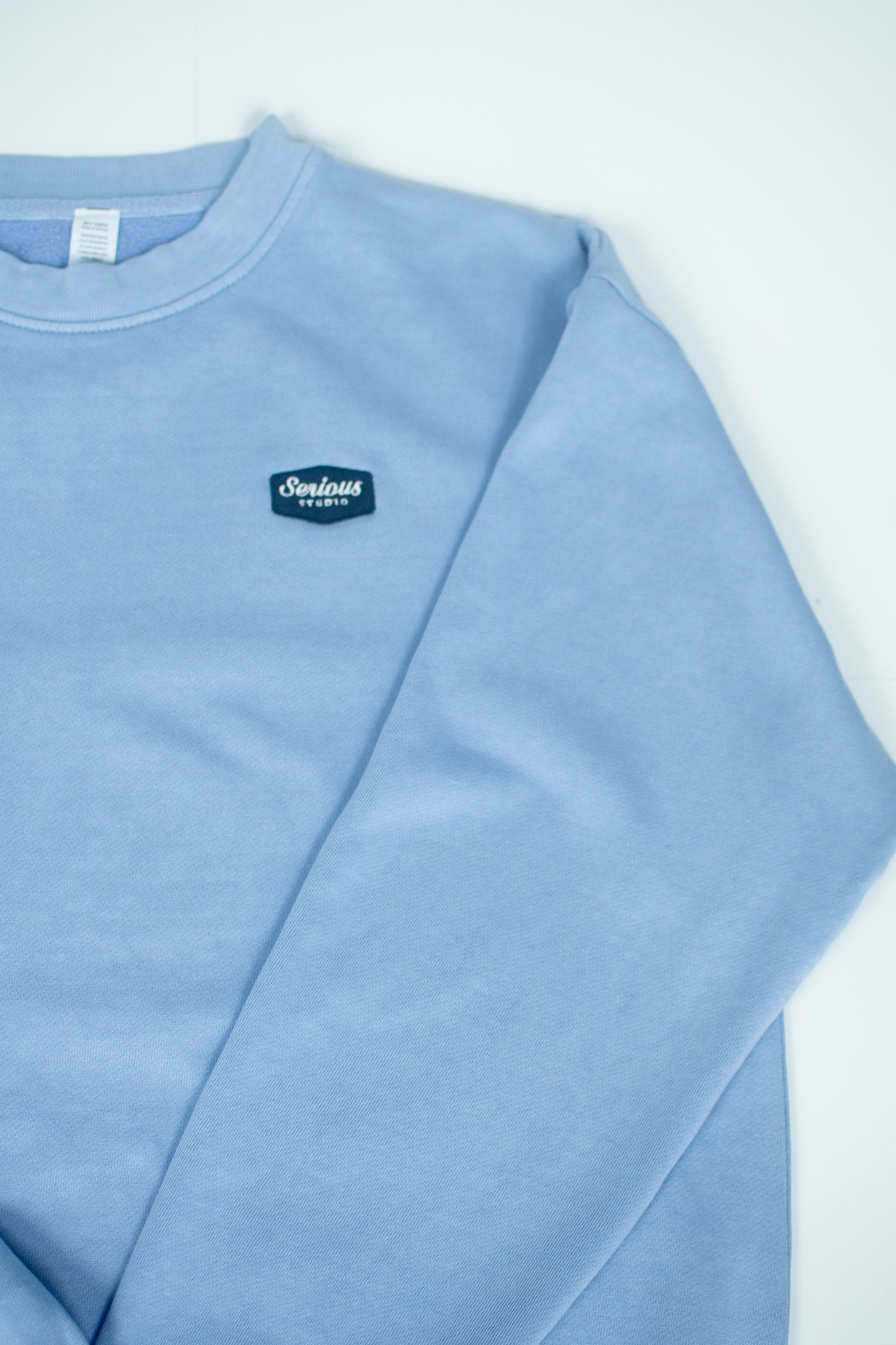 *PRE-ORDER* SERIOUS STUDIO ICONIC CREW NECK SWEATSHIRT - PEBBLE BLUE